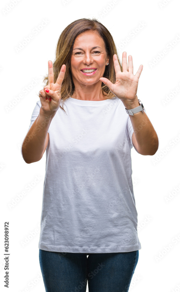 Middle age senior hispanic woman over isolated background showing and pointing up with fingers number seven while smiling confident and happy. Middle age senior hispanic woman over isolated background showing and pointing up with fingers number seven while smiling confident and happy.