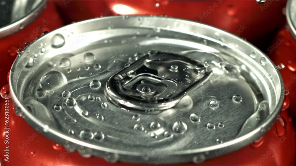 Drops of water fall on a can of cola. Filmed is slow motion 1000 fps. High quality FullHD footage Drops of water fall on a can of cola. Filmed is slow motion 1000 fps. High quality FullHD footage