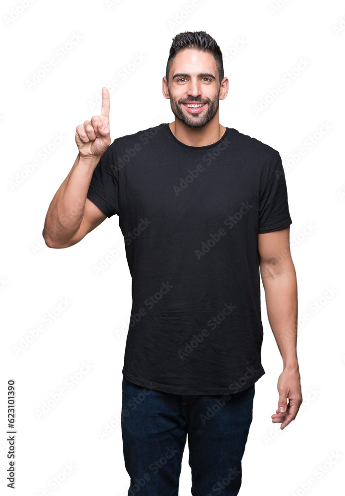 Young handsome man over isolated background showing and pointing up with finger number one while smiling confident and happy. Young handsome man over isolated background showing and pointing up with finger number one while smiling confident and happy.