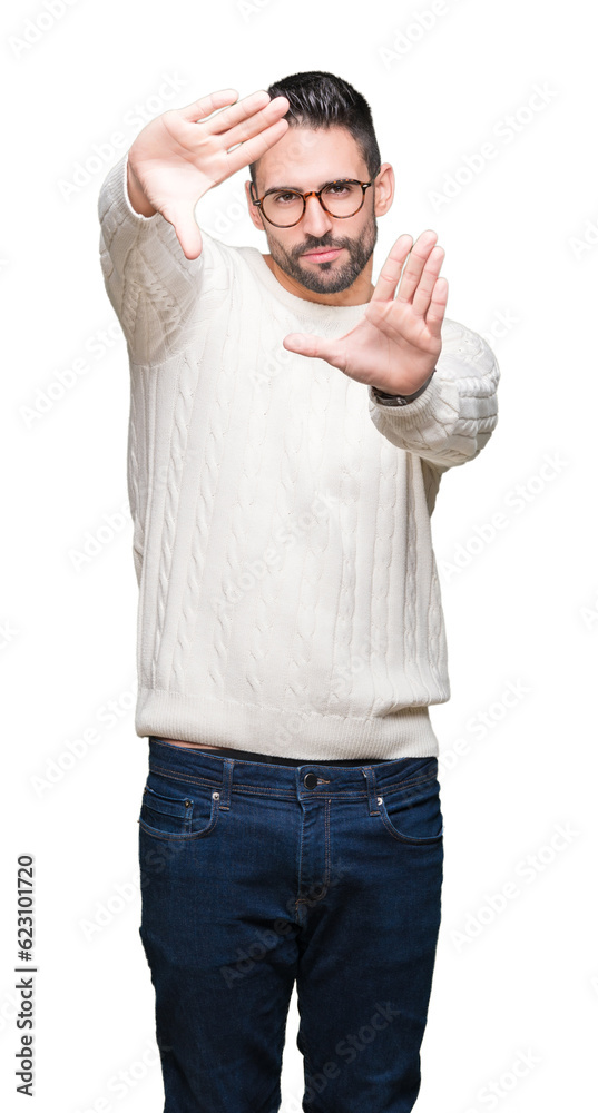 Young handsome man wearing glasses over isolated background Smiling doing frame using hands palms and fingers, camera perspective