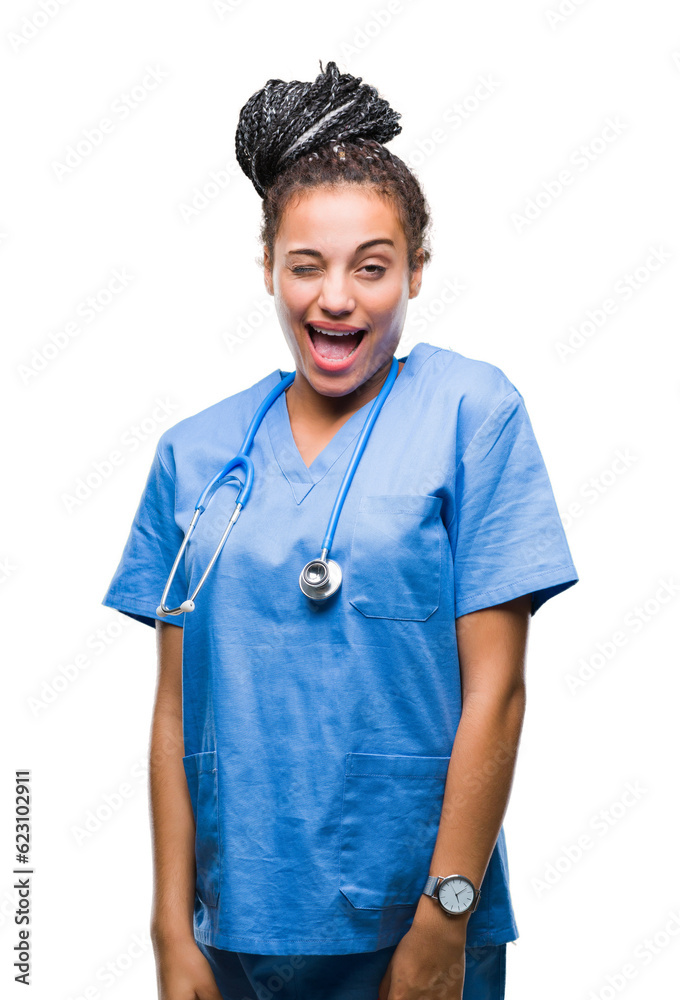 Young braided hair african american girl professional surgeon over isolated background winking looking at the camera with sexy expression, cheerful and happy face. Young braided hair african american girl professional surgeon over isolated background winking looking at the camera with sexy expression, cheerful and happy face.