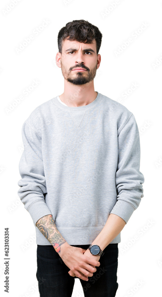 Young handsome man wearing sweatshirt over isolated background skeptic and nervous, frowning upset because of problem. Negative person. Young handsome man wearing sweatshirt over isolated background skeptic and nervous, frowning upset because of problem. Negative person.