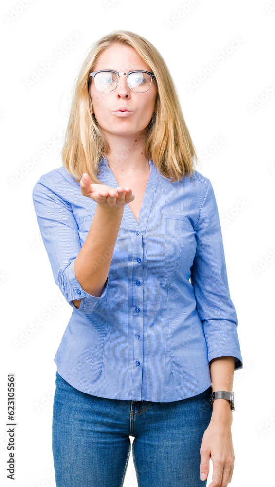 Beautiful young business woman over isolated background looking at the camera blowing a kiss with hand on air being lovely and sexy. Love expression. Beautiful young business woman over isolated background looking at the camera blowing a kiss with hand on air being lovely and sexy. Love expression.