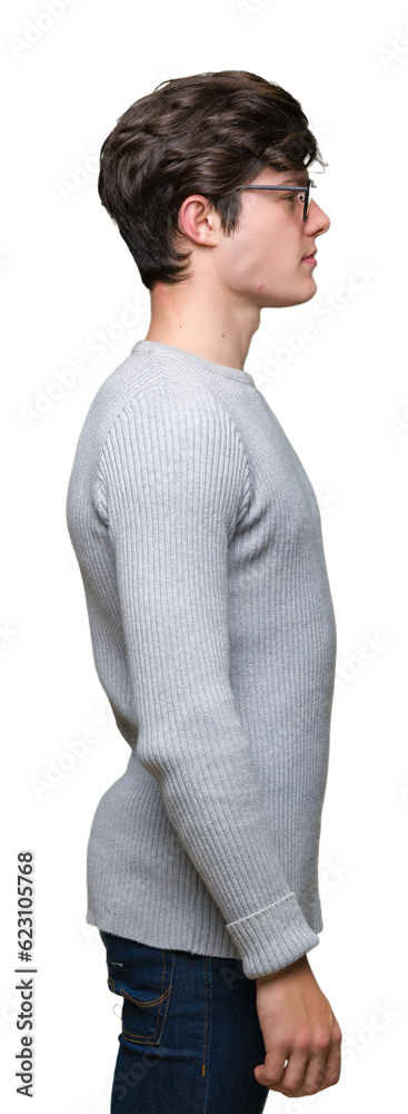 Young handsome man wearing glasses over isolated background looking to side, relax profile pose with natural face with confident smile. Young handsome man wearing glasses over isolated background looking to side, relax profile pose with natural face with confident smile.