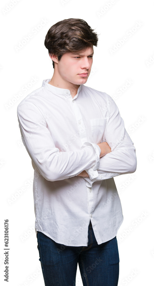 Young handsome business man over isolated background skeptic and nervous, disapproving expression on face with crossed arms. Negative person. Young handsome business man over isolated background skeptic and nervous, disapproving expression on face with crossed arms. Negative person.