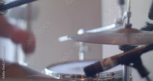 Close-up of hi-hat in drum set, partly in focus photo