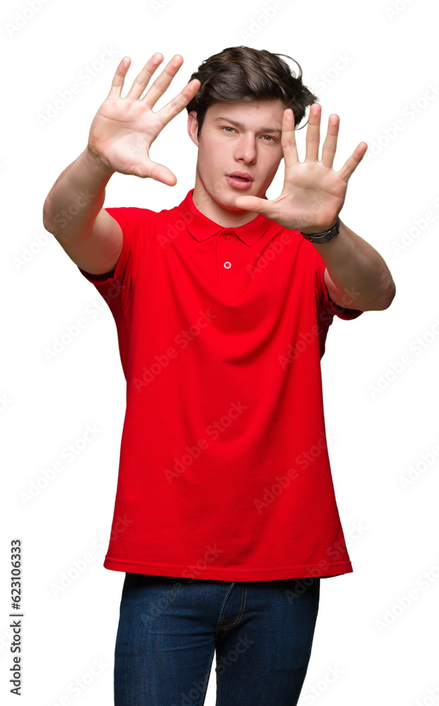 Young handsome man wearing red t-shirt over isolated background Smiling doing frame using hands palms and fingers, camera perspective Young handsome man wearing red t-shirt over isolated background Smiling doing frame using hands palms and fingers, camera perspective