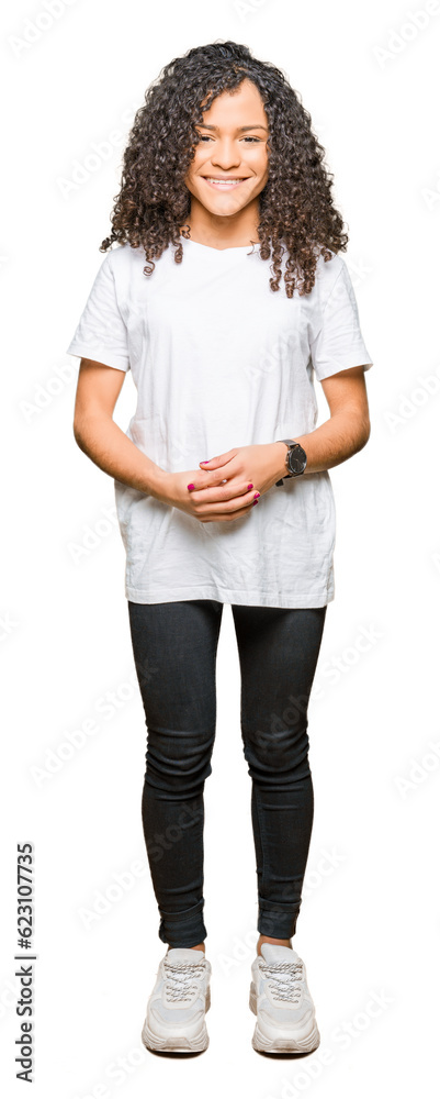 Young beautiful woman with curly hair wearing white t-shirt Hands together and fingers crossed smiling relaxed and cheerful. Success and optimistic