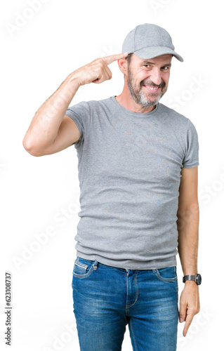 Handsome middle age hoary senior man wearing sport cap over isolated background Smiling pointing to head with one finger, great idea or thought, good memory
