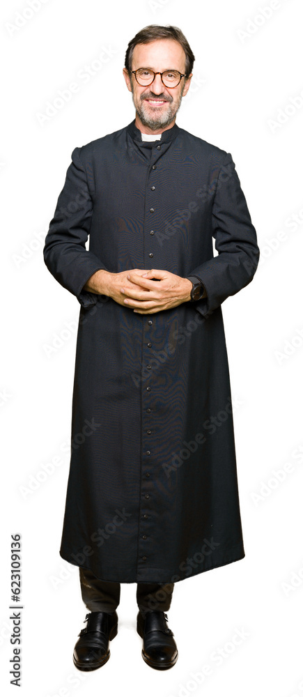 Middle age priest man wearing catholic robe Hands together and fingers crossed smiling relaxed and cheerful. Success and optimistic