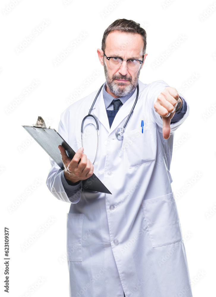 Middle age senior hoary doctor man holding clipboard over isolated background with angry face, negative sign showing dislike with thumbs down, rejection concept Middle age senior hoary doctor man holding clipboard over isolated background with angry face, negative sign showing dislike with thumbs down, rejection concept