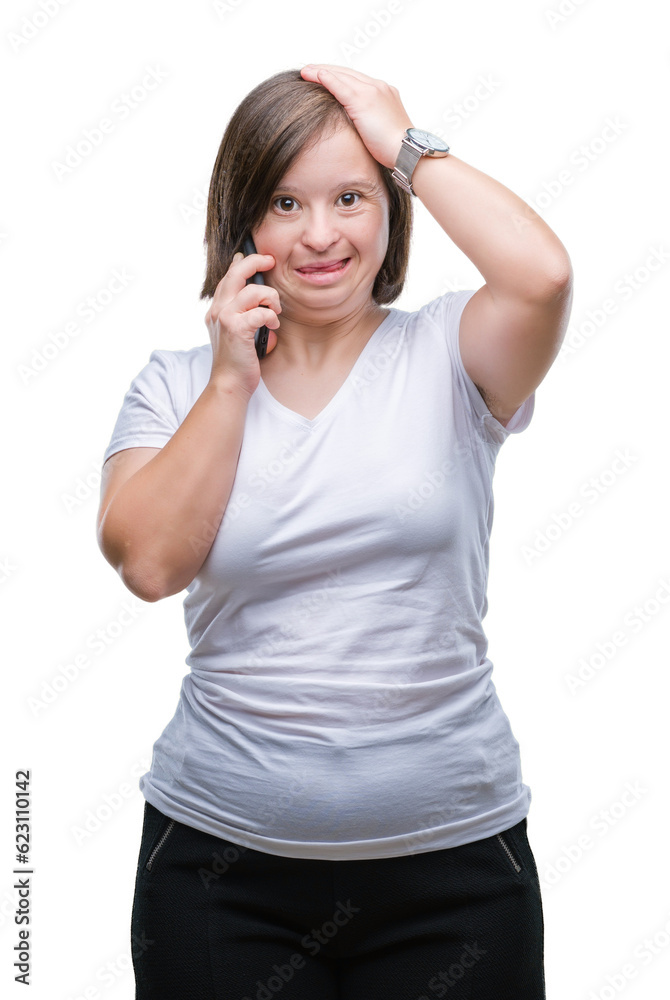 Young adult woman with down syndrome taking using smartphone over isolated background stressed with hand on head, shocked with shame and surprise face, angry and frustrated. Fear and upset Young adult woman with down syndrome taking using smartphone over isolated background stressed with hand on head, shocked with shame and surprise face, angry and frustrated. Fear and upset