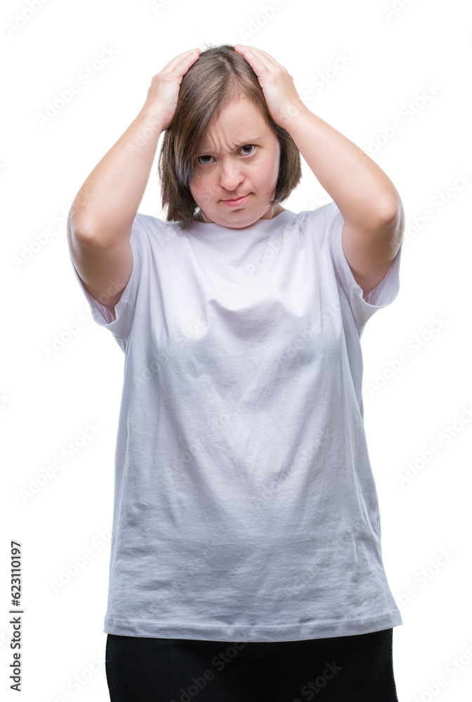 Young adult woman with down syndrome over isolated background suffering from headache desperate and stressed because pain and migraine. Hands on head. Young adult woman with down syndrome over isolated background suffering from headache desperate and stressed because pain and migraine. Hands on head.
