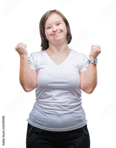 Young adult woman with down syndrome over isolated background celebrating surprised and amazed for success with arms raised and open eyes. Winner concept. © Krakenimages.com