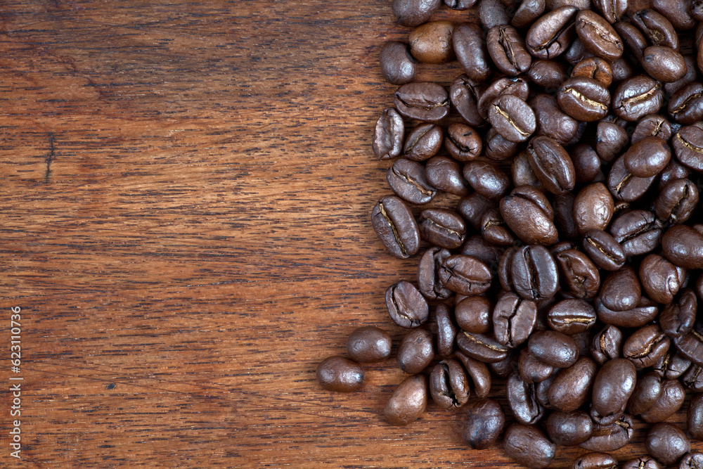 Fototapeta premium coffee Beans on wood background