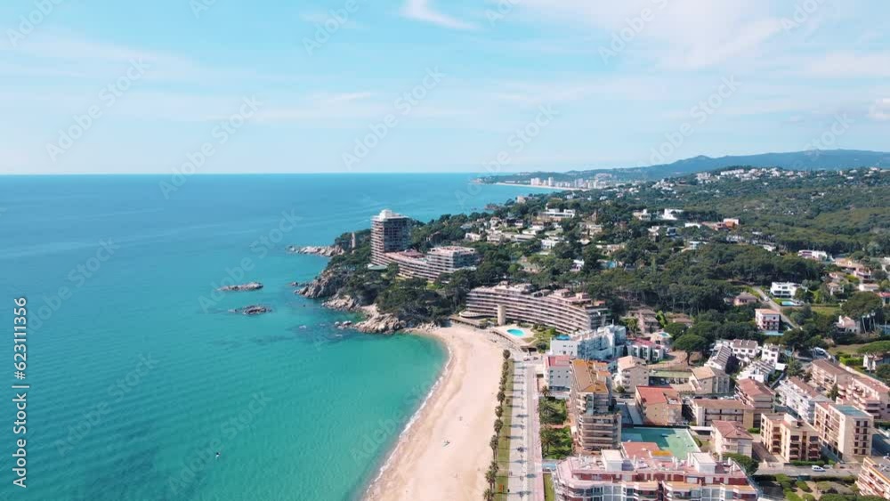 Aerial cityscape view of beach and Mediterranean Sea along Costa Brava in Palamoes Catalonia