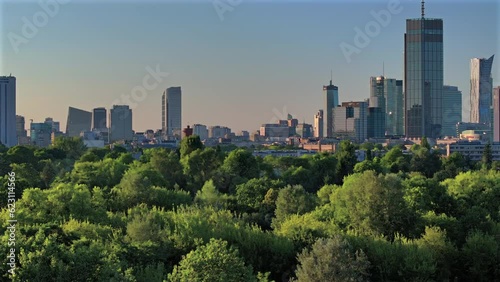 Aerial, drone panorama of Warsaw city during sunset. View from Pole Mokotowskie Park 