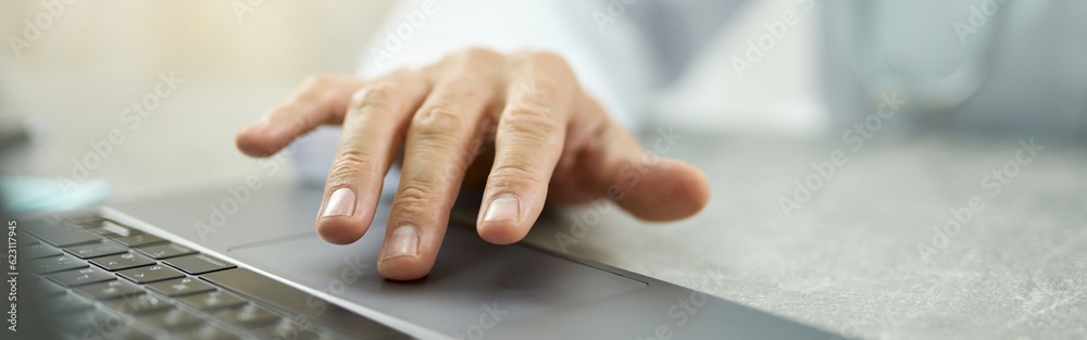 Male doctor hand using modern laptop in clinic Male doctor hand using modern laptop in clinic