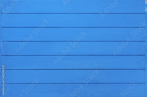 Bright blue wooden planks background top view