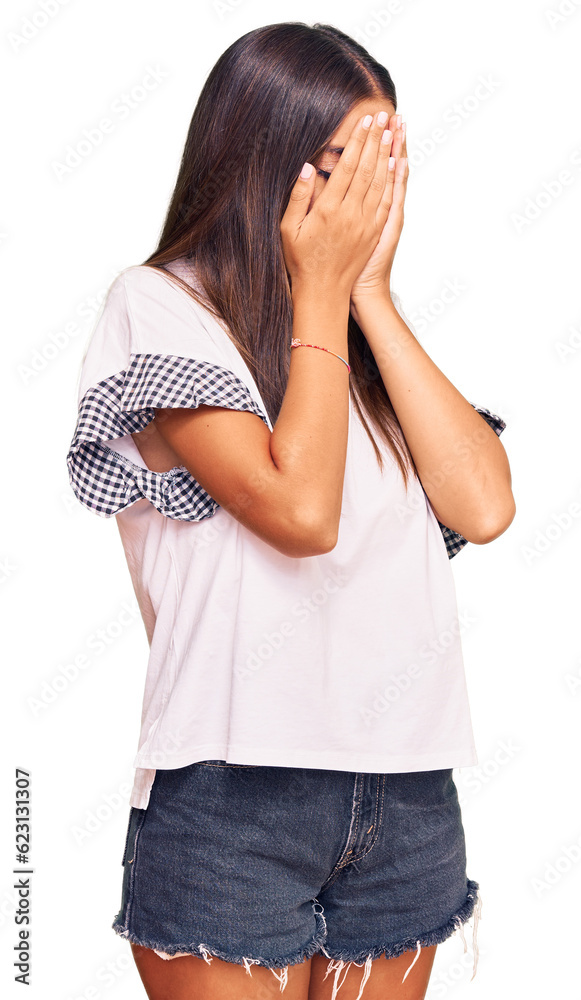 Young hispanic woman wearing casual clothes with sad expression covering face with hands while crying. depression concept. Young hispanic woman wearing casual clothes with sad expression covering face with hands while crying. depression concept.