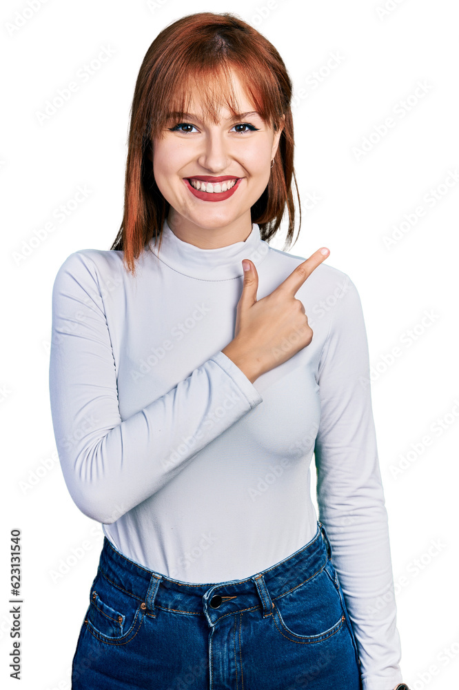 Redhead young woman wearing casual turtleneck sweater cheerful with a smile on face pointing with hand and finger up to the side with happy and natural expression Redhead young woman wearing casual turtleneck sweater cheerful with a smile on face pointing with hand and finger up to the side with happy and natural expression