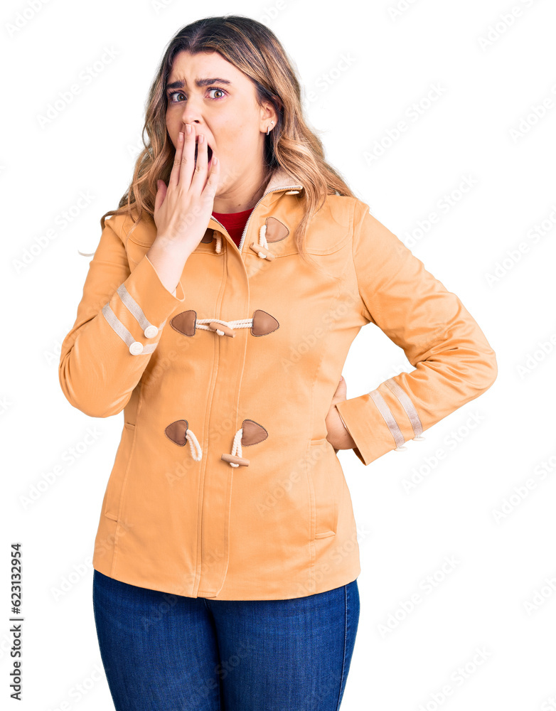 Young caucasian woman wearing casual clothes bored yawning tired covering mouth with hand. restless and sleepiness. Young caucasian woman wearing casual clothes bored yawning tired covering mouth with hand. restless and sleepiness.