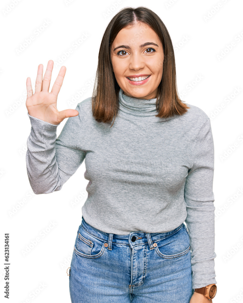 Young beautiful woman wearing casual turtleneck sweater showing and pointing up with fingers number five while smiling confident and happy.