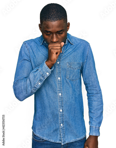 Young african american man wearing casual clothes feeling unwell and coughing as symptom for cold or bronchitis. health care concept.