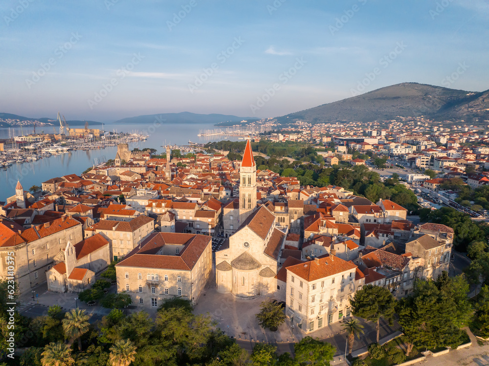 Amazing panoramic view of the picturesque town of Trogir in Croatia, the old town with beautiful historic buildings bathed in morning light, the promenades and the surrounding Adriatic Sea