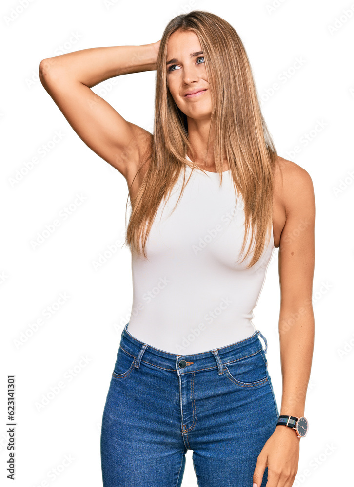 Young blonde woman wearing casual style with sleeveless shirt confuse and wondering about question. uncertain with doubt, thinking with hand on head. pensive concept. Young blonde woman wearing casual style with sleeveless shirt confuse and wondering about question. uncertain with doubt, thinking with hand on head. pensive concept.