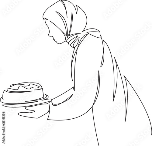 muslim woman with cake