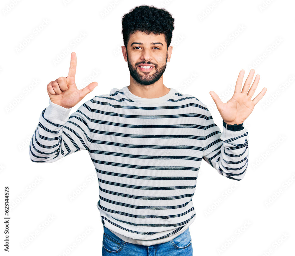 Young arab man with beard wearing casual striped sweater showing and pointing up with fingers number seven while smiling confident and happy. Young arab man with beard wearing casual striped sweater showing and pointing up with fingers number seven while smiling confident and happy.