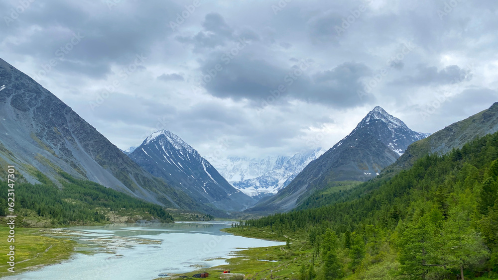 Picturesque view of the stunning peaks of Altai. Hike to the foot of Belukha. Beautiful Akkem lake. Picturesque view of the stunning peaks of Altai. Hike to the foot of Belukha. Beautiful Akkem lake. Picturesque view of the stunning peaks of Altai. Hike to the foot of Belukha. Beautiful Akkem lake. Picturesque view of the stunning peaks of Altai. Hike to the foot of Belukha. Beautiful Akkem lake.