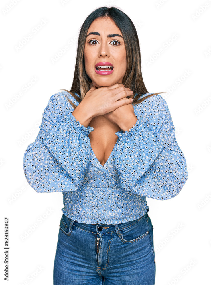 Young hispanic woman wearing casual clothes shouting and suffocate because painful strangle. health problem. asphyxiate and suicide concept. Young hispanic woman wearing casual clothes shouting and suffocate because painful strangle. health problem. asphyxiate and suicide concept.