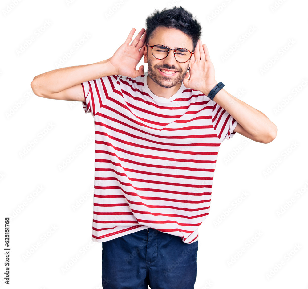 Young hispanic man wearing casual clothes trying to hear both hands on ear gesture, curious for gossip. hearing problem, deaf Young hispanic man wearing casual clothes trying to hear both hands on ear gesture, curious for gossip. hearing problem, deaf