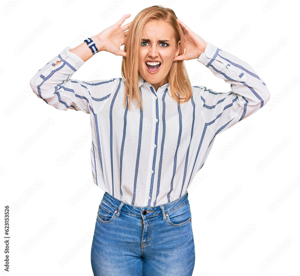 Beautiful caucasian woman wearing casual clothes crazy and scared with hands on head, afraid and surprised of shock with open mouth Beautiful caucasian woman wearing casual clothes crazy and scared with hands on head, afraid and surprised of shock with open mouth