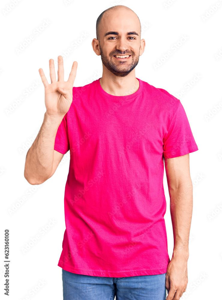 Fototapeta premium Young handsome man wearing casual t shirt showing and pointing up with fingers number four while smiling confident and happy.