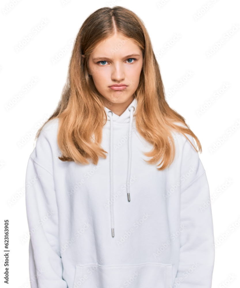 Beautiful young caucasian girl wearing casual sweatshirt depressed and worry for distress, crying angry and afraid. sad expression. Beautiful young caucasian girl wearing casual sweatshirt depressed and worry for distress, crying angry and afraid. sad expression.