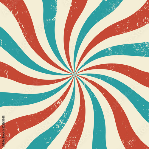 Vintage retro background. Rays with grunge texture. Colorful vintage wallpaper with sunbeams. Spiral red and blue.