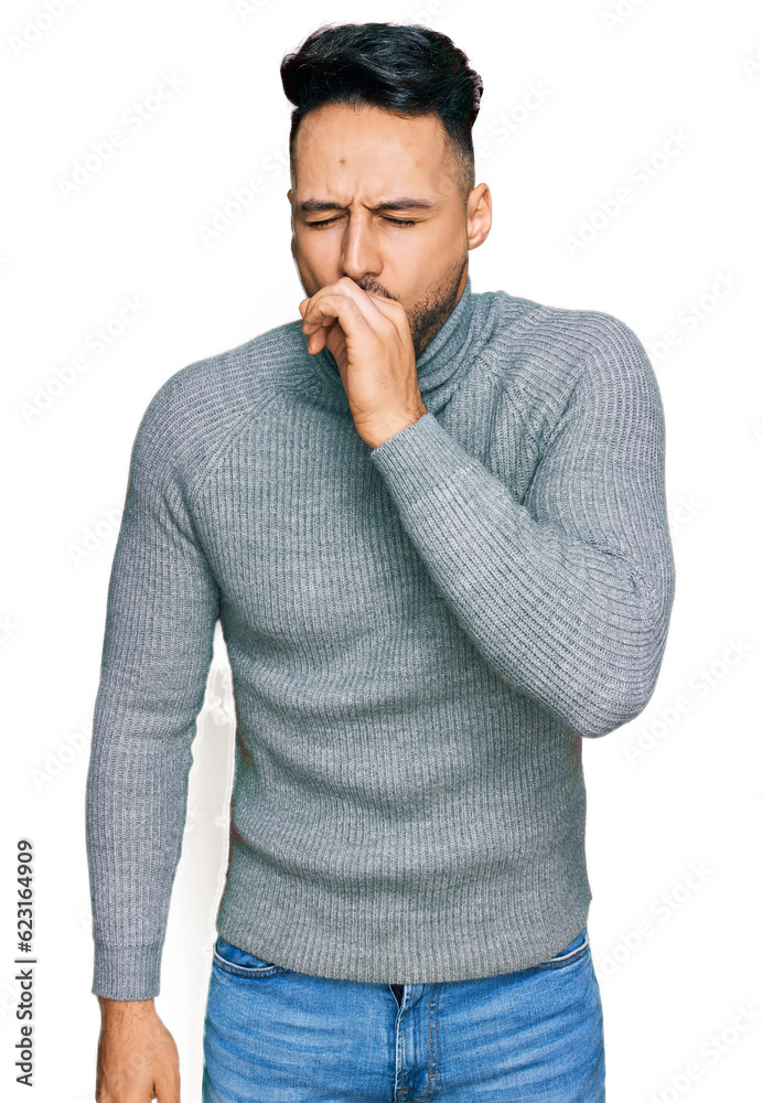 Young arab man wearing casual clothes feeling unwell and coughing as symptom for cold or bronchitis. health care concept. Young arab man wearing casual clothes feeling unwell and coughing as symptom for cold or bronchitis. health care concept.