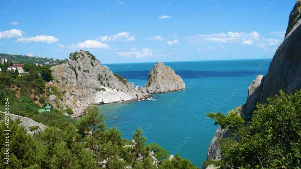 A nature scenery of a calm sea and green bushes, with Lions Head mountain in the horizon. Landscape of the ocean near the mountains with blue cloud sky and copy space. High quality photo A nature scenery of a calm sea and green bushes, with Lions Head mountain in the horizon. Landscape of the ocean near the mountains with blue cloud sky and copy space. High quality photo