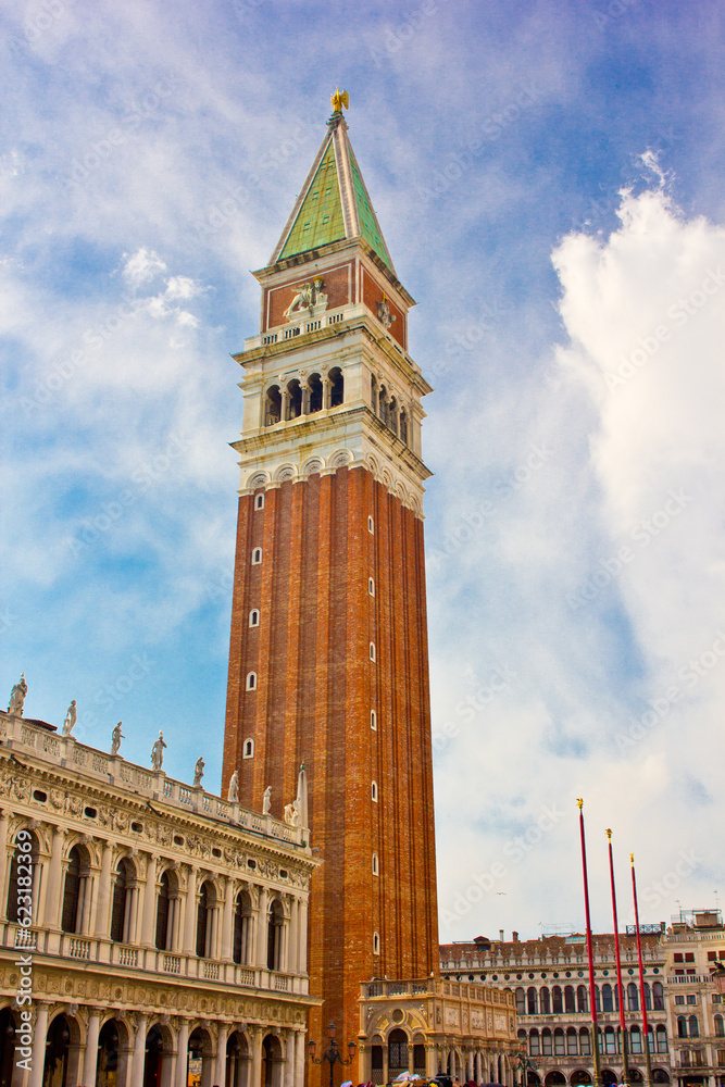 view of bell tower in san marco place in venice in italy
