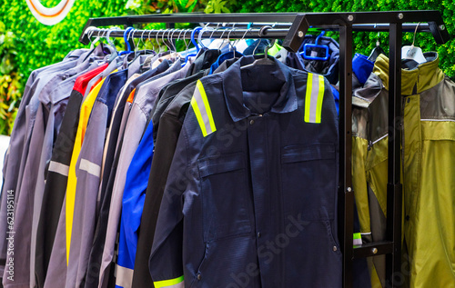 Special protective, work clothes, various jackets for builders, workers of the oil and gas industry on display in the store