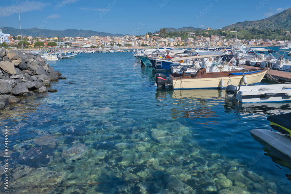 Obraz premium small boat harbor, marina in Giardini Naxos, Sicily, Italy