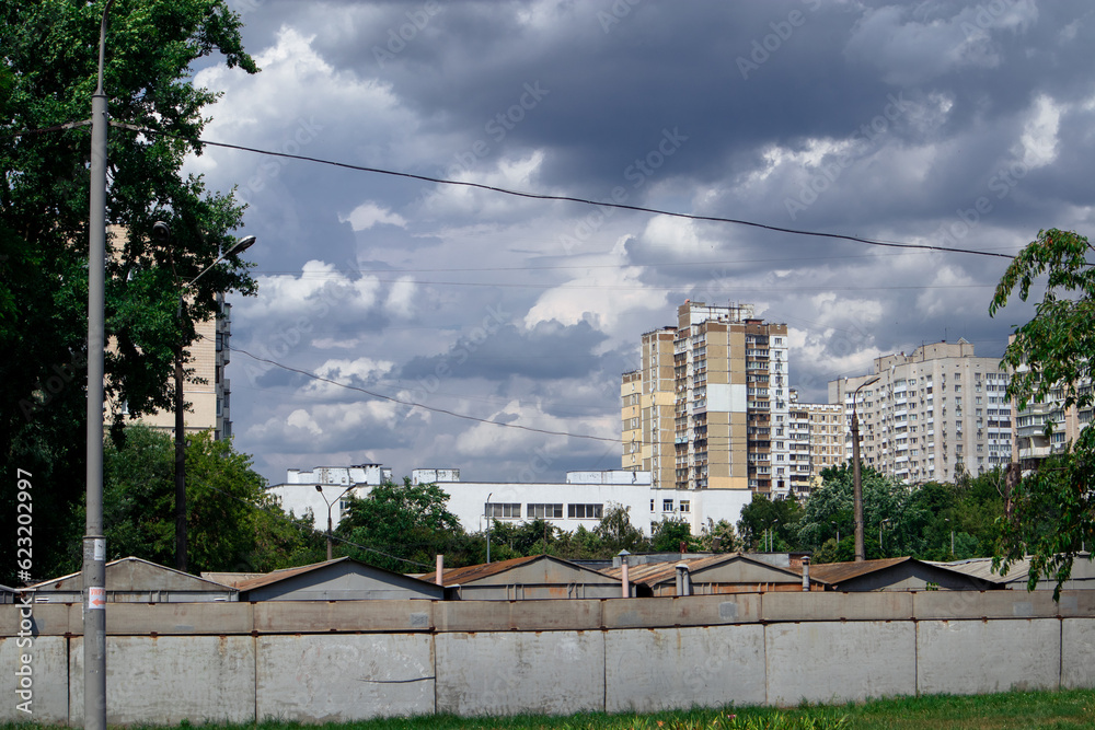 View of the city of Kyiv under heavy gray clouds