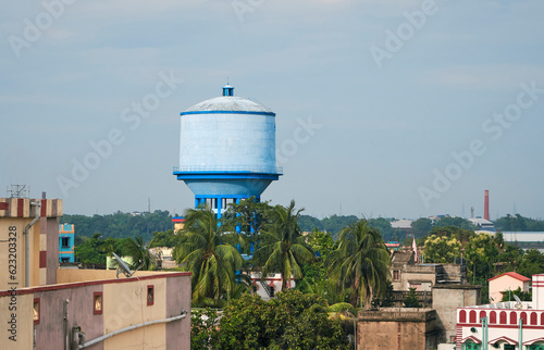 high angle view of a large overhead storage tank (reservoir for drinking water) in a suburban area of Hooghly, West Bengal.