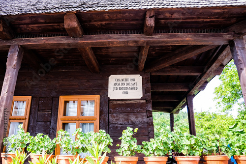 Old museum house in the courtyard of the Izbuc monastery. Bihor, Romania. photo