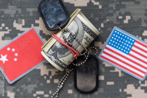 Foto USA and North Korea military relations, Identification dog tags on digital camouflage fabric