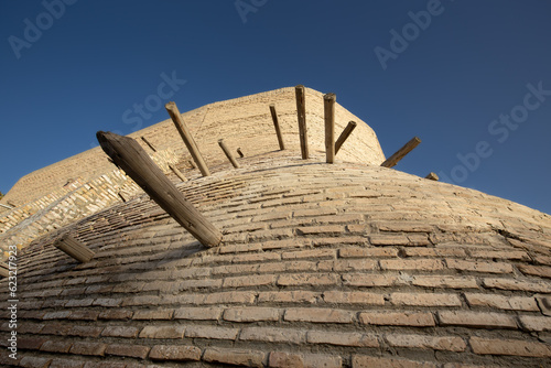 Ancient archaeological heritage Zindan or Zindon Emir prison with brick walls, Bukhara, Uzbekistan photo