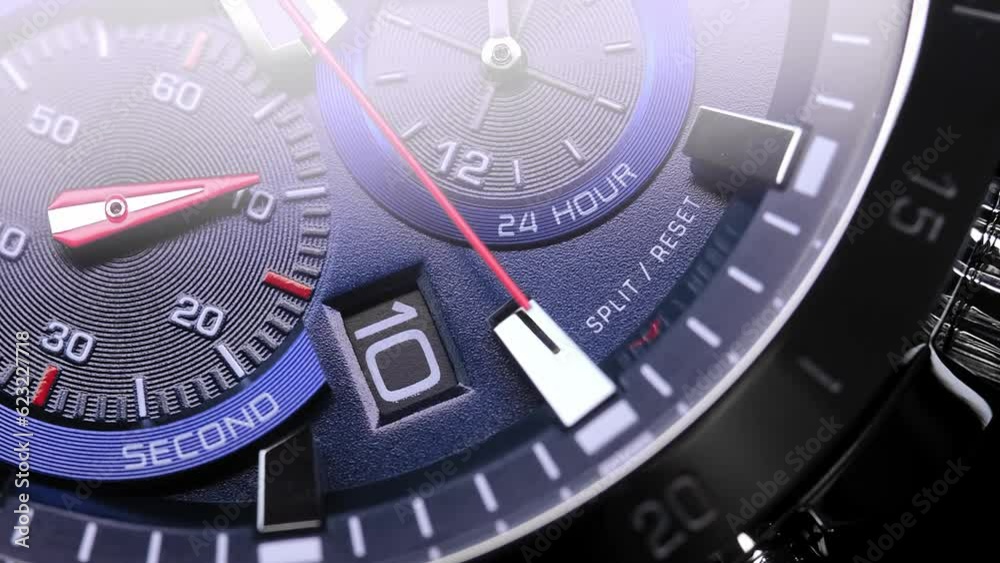 Close Up Of Stylish Luxury Man Wrist Watch With Moving Hand And Multiple Dials. Men's Swiss chronograph watch in metal with sapphire crystal. closeup view of rotating watch , running second arrow